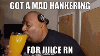 A Man Wearing Headphones Is Drinking A Glass Of Orange Juice With The Caption Got A Mad Hankering For Juice Rn GIF