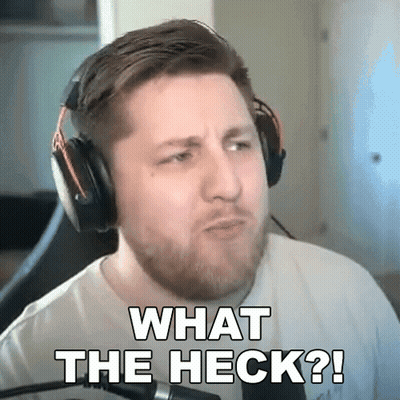 A Man Wearing Headphones Is Making A Funny Face And Says What The Heck ? GIF