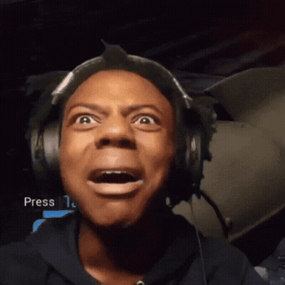 A Man Wearing Headphones Is Making A Funny Face In Front Of A Screen That Says Press GIF