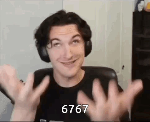A Man Wearing Headphones Is Making A Funny Face While Sitting In A Chair With His Hands Outstretched . GIF