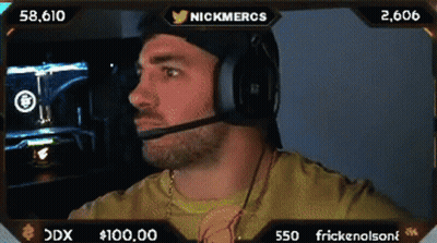 A Man Wearing Headphones Is On A Screen With The Name Nickmercs GIF