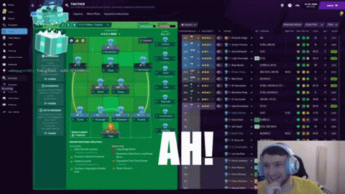 A Man Wearing Headphones Is Playing A Video Game With The Word Ah Written On The Screen GIF