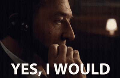 A Man Wearing Headphones Is Saying Yes I Would GIF
