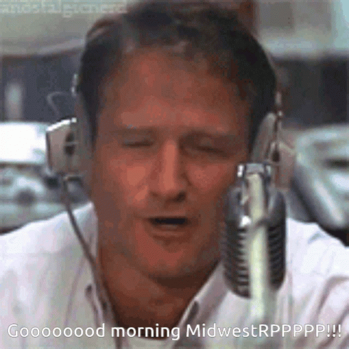 A Man Wearing Headphones Is Singing Into A Microphone And The Caption Says Good Morning Midwestrppppp !! GIF