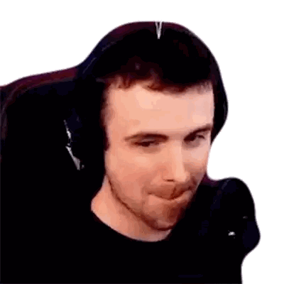A Man Wearing Headphones Is Sitting In A Chair And Making A Funny Face Sticker