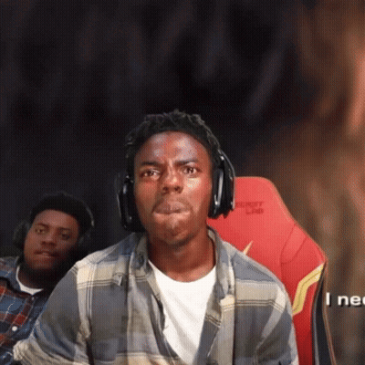 A Man Wearing Headphones Is Sitting In A Red Chair With The Word Drift On The Back GIF