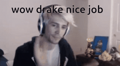 A Man Wearing Headphones Is Sitting In Front Of A Computer Screen And Says Wow Drake Nice Job . GIF