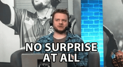 A Man Wearing Headphones Is Sitting In Front Of A Laptop Computer And Says No Surprise At All . GIF