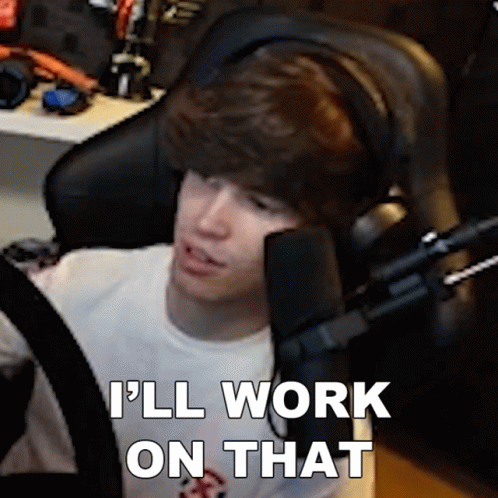 A Man Wearing Headphones Is Sitting In Front Of A Microphone And Saying `` I 'Ll Work On That '' GIF