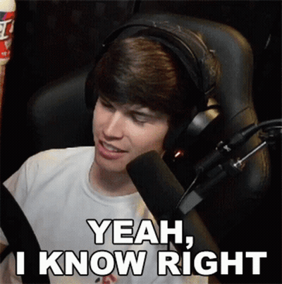 A Man Wearing Headphones Is Sitting In Front Of A Microphone And Says " Yeah I Know Right " GIF