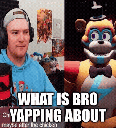 A Man Wearing Headphones Is Sitting In Front Of A Microphone Next To A Stuffed Animal . GIF