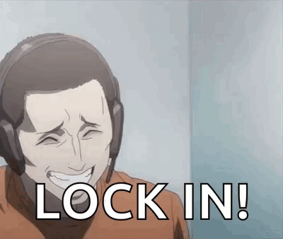 A Man Wearing Headphones Is Smiling And Saying Lock In ! GIF