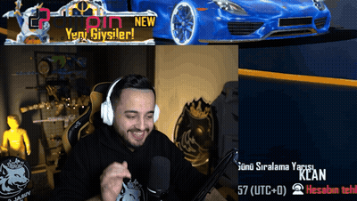 A Man Wearing Headphones Is Smiling In Front Of A Blue Car That Says New GIF
