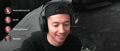 A Man Wearing Headphones Is Smiling In Front Of A Screen That Says Hamsterman00 And Skin GIF