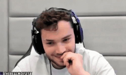 A Man Wearing Headphones Is Smiling With The Words Therealnoisesb Below Him GIF