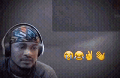 A Man Wearing Headphones Is Surrounded By Emojis Including One That Is Crying GIF