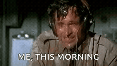 A Man Wearing Headphones Is Sweating And Crying . GIF