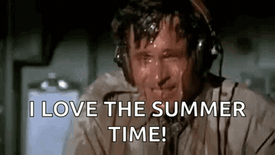 A Man Wearing Headphones Is Sweating And Saying I Love The Summer Time . GIF