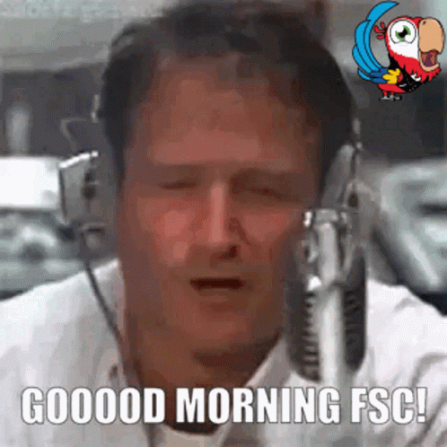 A Man Wearing Headphones Is Talking Into A Microphone And Says Good Morning Fsc GIF