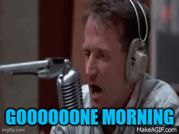 A Man Wearing Headphones Is Talking Into A Microphone And Says " Good Morning " GIF