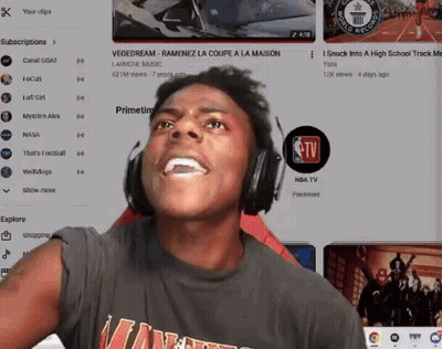 A Man Wearing Headphones Is Watching A Youtube Video GIF