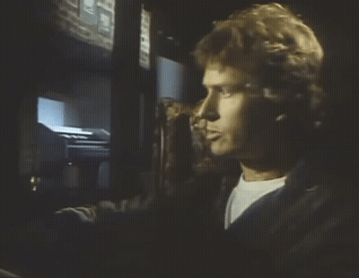 A Man Wearing Headphones Looks At A Screen That Says ' I 'M Sorry ' On It GIF