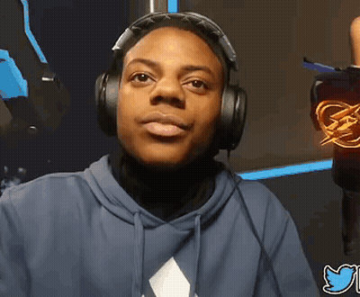 A Man Wearing Headphones Looks At The Camera With A Twitter Logo Behind Him GIF