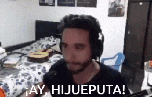 A Man Wearing Headphones Says " Ay Hijueputa " In Spanish GIF