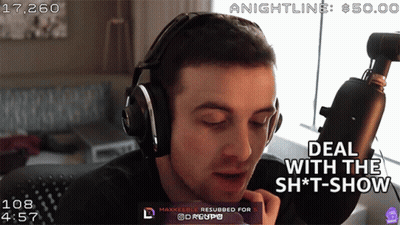 A Man Wearing Headphones Says Deal With The Shit Show GIF