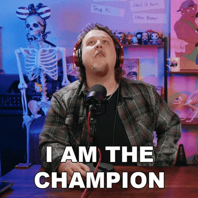 A Man Wearing Headphones Says " I Am The Champion " GIF