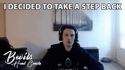 A Man Wearing Headphones Says " I Decided To Take A Step Back " On The Screen GIF