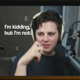 A Man Wearing Headphones Says " I 'M Kidding But I 'M Not " In Front Of A Microphone GIF