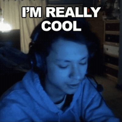 A Man Wearing Headphones Says " I 'M Really Cool " In White Letters GIF