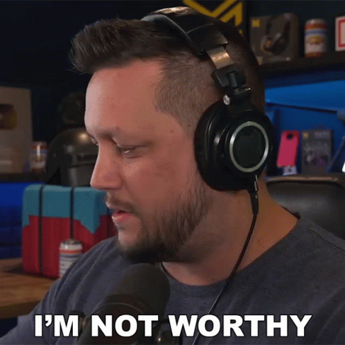 A Man Wearing Headphones Says That He Is Not Worthy GIF