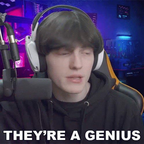 A Man Wearing Headphones Says They 'Re A Genius In Front Of A Microphone GIF