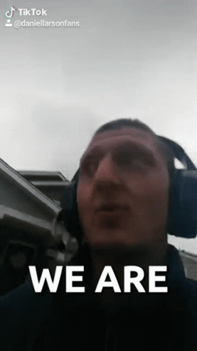 A Man Wearing Headphones Says We Are On A Tik Tok Video GIF