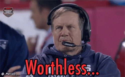 A Man Wearing Headphones Says Worthless In Red GIF