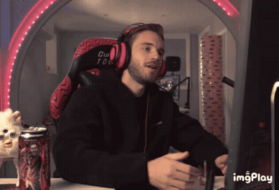 A Man Wearing Headphones Sits In A Chair That Says Cw 108 On It GIF