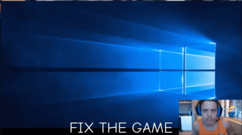 A Man Wearing Headphones Stands In Front Of A Blue Windows Screen With The Words Fix The Game Below Him GIF