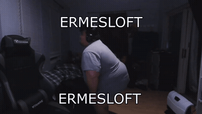 A Man Wearing Headphones Stands In Front Of A Chair That Says Ermesloft On It GIF