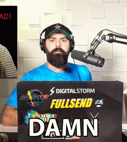 A Man Wearing Headphones Stands In Front Of A Digital Storm Fullsend Damn Sign GIF