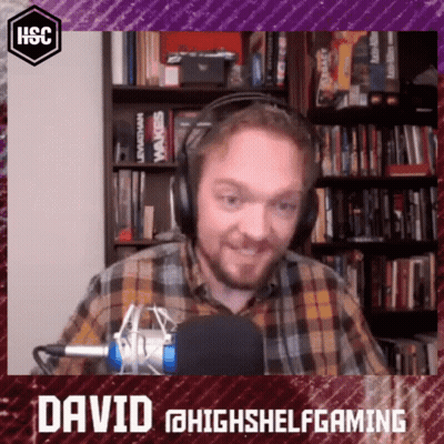 A Man Wearing Headphones Stands In Front Of A Microphone And Says David @Highshelfgaming On The Bottom GIF