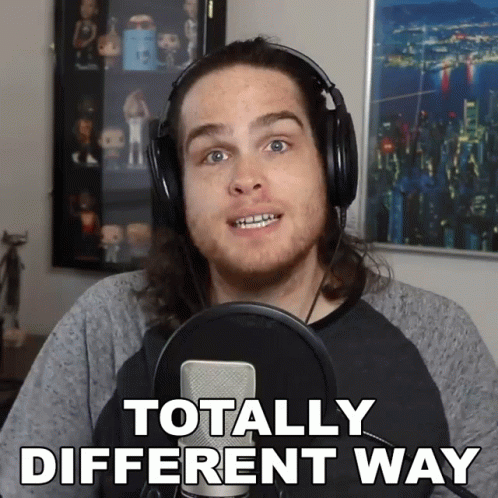 A Man Wearing Headphones Stands In Front Of A Microphone With The Words Totally Different Way Below Him GIF