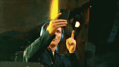 A Man Wearing Headphones Takes A Picture Of Himself GIF