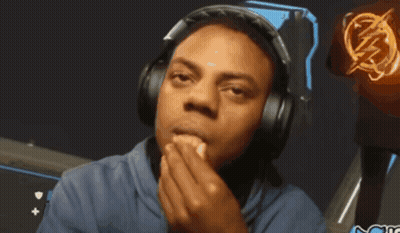 A Man Wearing Headphones With A Lightning Bolt On His Shirt GIF