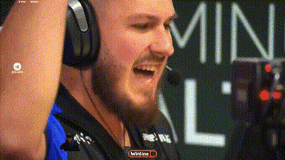 A Man Wearing Headphones With A Winline Logo In The Corner GIF