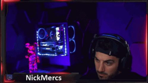 A Man Wearing Headphones With Nickmercs Written On The Bottom GIF