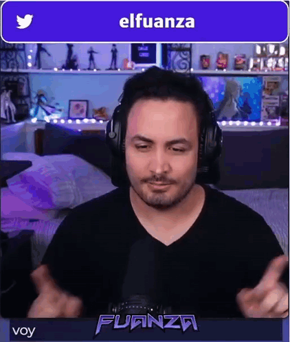 A Man Wearing Headphones With The Name Elfuanza On The Bottom Right GIF