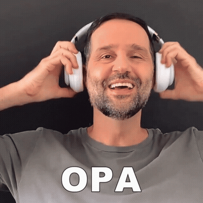 A Man Wearing Headphones With The Word Opa In White Letters GIF