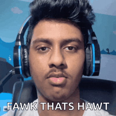 A Man Wearing Headphones With The Words Fawk Thats Hawt On The Bottom GIF